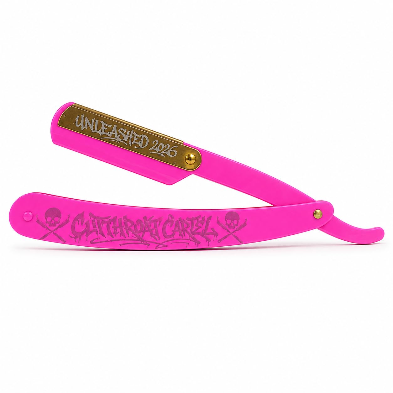 The Cutthroat Cartel folding barber's razor open, with a hot-pink handle, brass-finished blade plate engraved Unleashed 2026, and Cutthroat Cartel lettering along the handle.